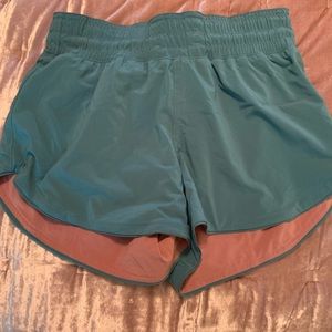 Reversible lululemon Pink and Teal 4 inch shorts